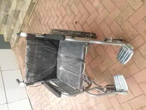Wheel Chair With Adjustable and Removable Swing-Away Footres