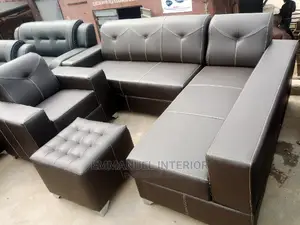 A 7 Seater Sofa, With an Automan