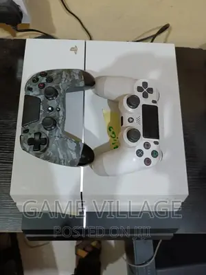 Fairly Used Playstation 4 Console With Games Accessories