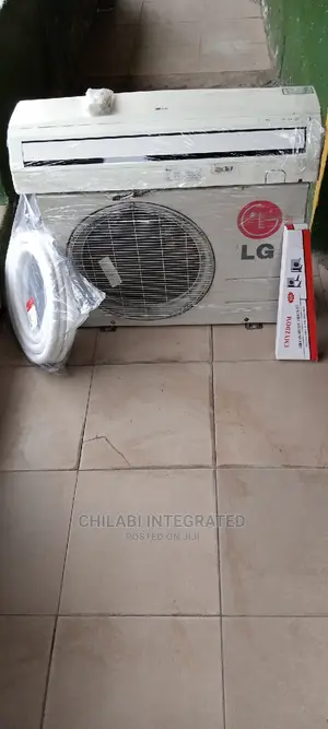 Almost New, Foreign Used 1.5HP LG Air Conditioner With Kits