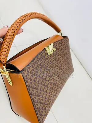 Quality Michael Kors Ladies Brown Leather Handbags.