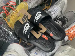 MP: Nike Unisex Slides