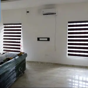 Burnt Orange and Black Window Blinds