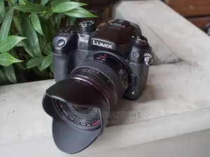 Panasonic Lumix Gh4 Camera + 14-140mm Lumix Lens