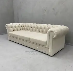 3 Seater Tufted Sofa Up for Grab