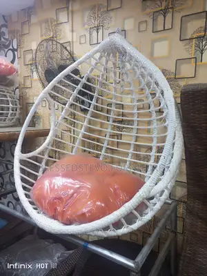 Luxury Indoor/Outdoor Rattan Made Hanging Swing Chair.