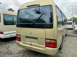 Toyota Coaster 2009 Gold