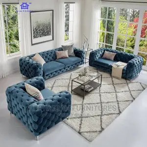 Blue Chesterfield Sofa With Pillows