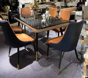 6sitter's Marble Dinning Table With It's 6 Quality Chairs.