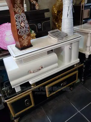 Adjustable TV Stand With Drawer and Cupboard.