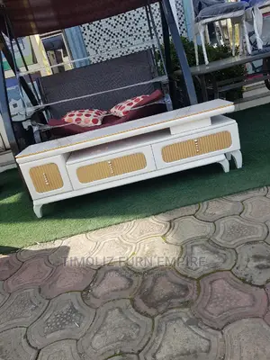 Adjustable Tv Stand With Various Storage Spaces.