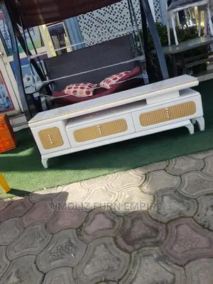 Adjustable Tv Stand With Various Storage Spaces.
