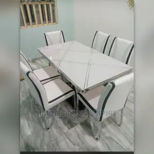 New Arrival/Tempered Glass Top Dining Table With Six Chairs.