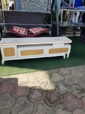 Foreign Adjustable TV Stand With Storage Spaces.