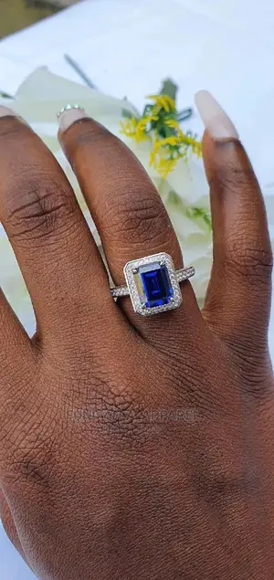 Touch Of Blue Princess Cut Engagement Ring